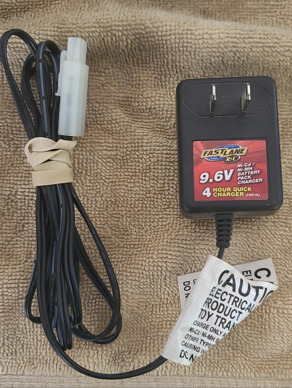 New Bright 9.6V NiMH Battery Charger and PacksNew Bright 9.6 Volts 1200 Bundle